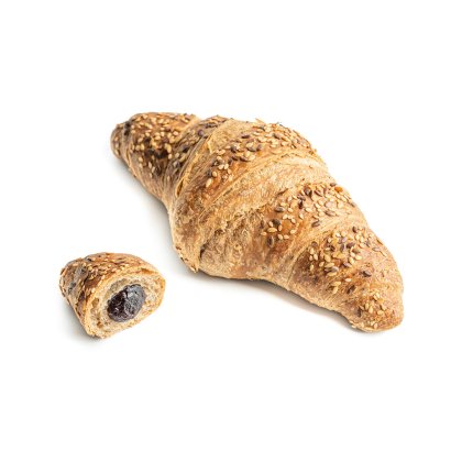 Croissant multicéréales au sésame, avec un petit morceau coupé révélant une garniture au chocolat noir.