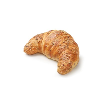 Croissant doré garni de graines variées, en forme de croissant de lune, fond blanc.